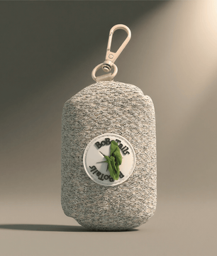 Chunky knitted pet poop bag holder with Carabiner clip to attached dog leash 