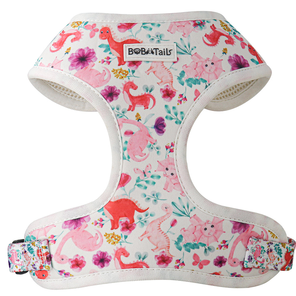 Dog harness with pink dinosaur and floral pattern designed as part of a matching dog and owner accessory system for everyday walks