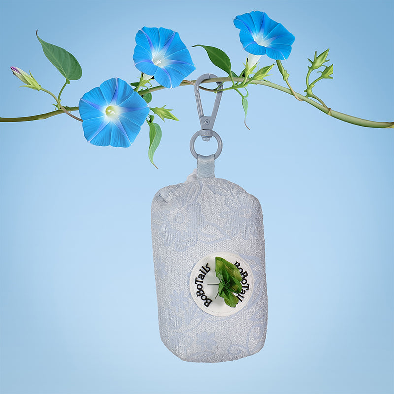 Morning Glory dog poop bag holder for leash matching the morning glory harness and owner accessories for daily dog walks