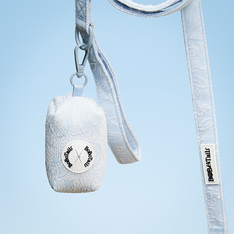 Morning Glory dog waste bag holder matching the Morning Glory harness and owner accessories for daily dog walks 