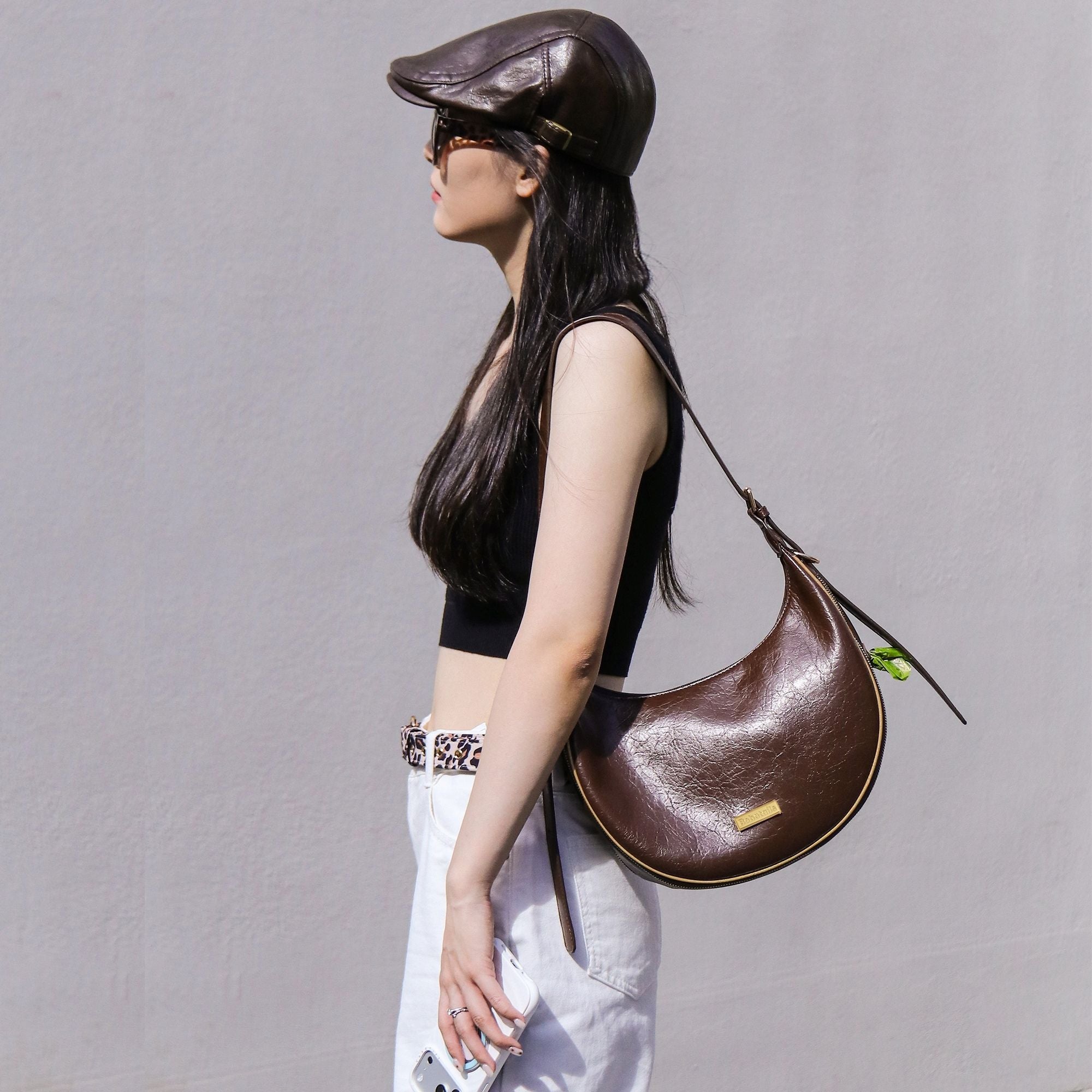 Crescent shoulder bag matching dog and owner accessories for everyday dog walks