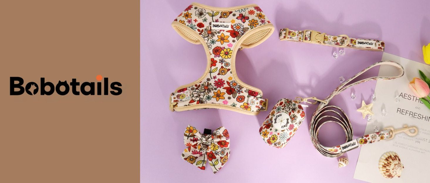 Flower Printed dog harness, collar, and tags with 'Bobotails' branding on a purple background.