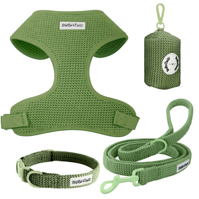 Ensemble comprenant un harnais pour pull, une laisse et un porte-sacs à crottes